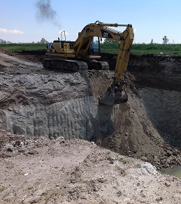 Extracción de Material de banco por medios mecánicos, con excavadoras marca caterpillar.